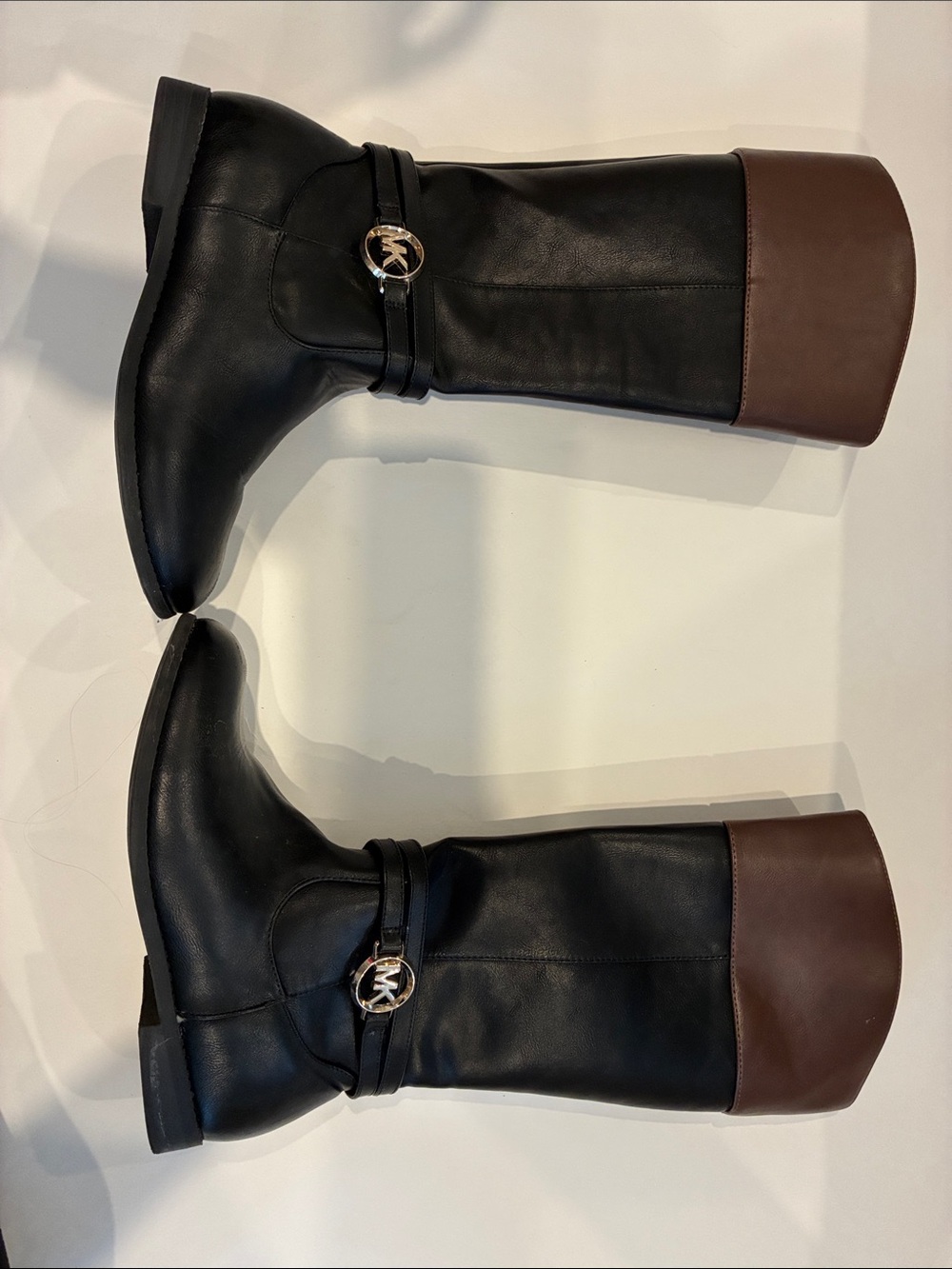 Girls Michael Kors Black Leather Tall Boots with contrasting brown tops.